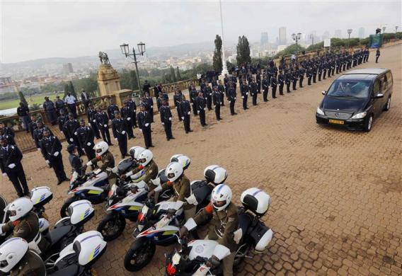 Cortege carrying the coffin of former South African President Nelson Mandela arrives at the Union Buildings, marking the start of a three-day lying-in state, in Pretoria