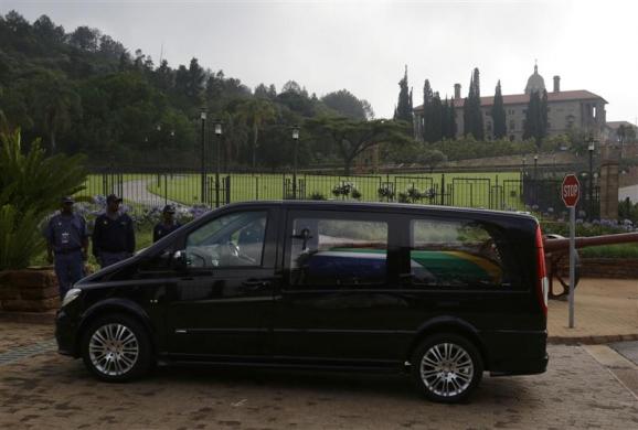 The funeral cortege carrying the coffin of former South African President Mandela arrives at the Union Buildings in Pretoria
